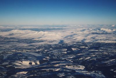 Aerial view of snow covered landscape