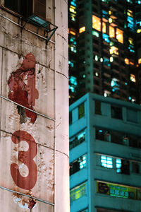 Low angle view of illuminated building at night