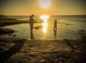 Scenic view of sea at sunset