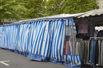 A market stall on a weekly german from the back
