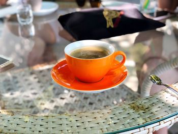 Close-up of coffee cup on table