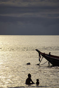 Scenic view of sea at sunset