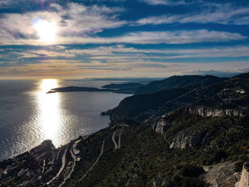 Scenic view of sea against sky during sunset