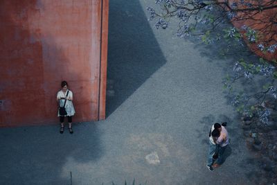 High angle view of people walking on street
