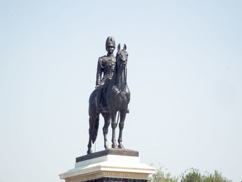 Low angle view of statue against clear sky