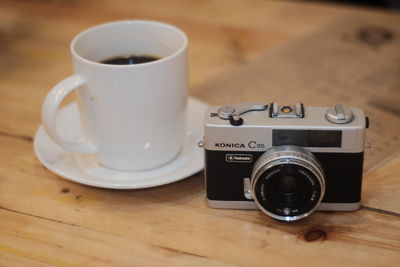 Close-up of camera on table