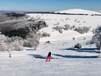 People on snow covered mountain