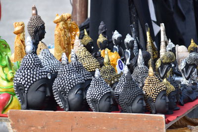 Statues for sale at market stall