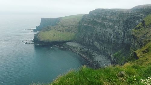 Scenic view of rock formation in sea