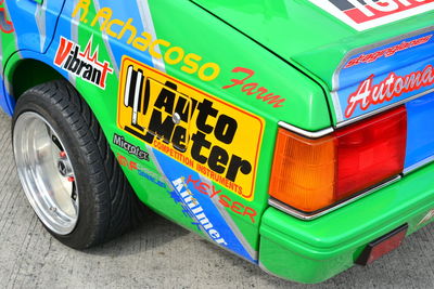 Close-up of toy car on street