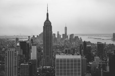 Modern buildings in city against sky