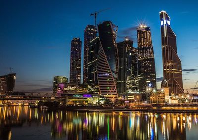 City lit up at dusk