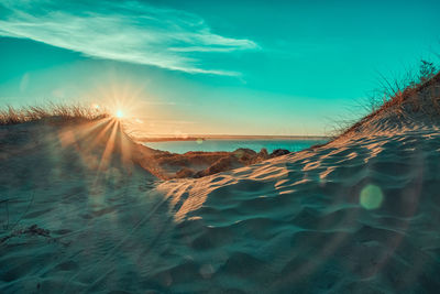 Panoramic shot of sea against sky during sunset