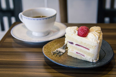 Close-up of cake served on table