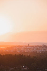 High angle view of townscape against clear sky during sunset