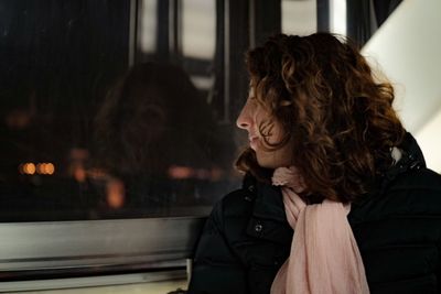 Portrait of a woman in a window