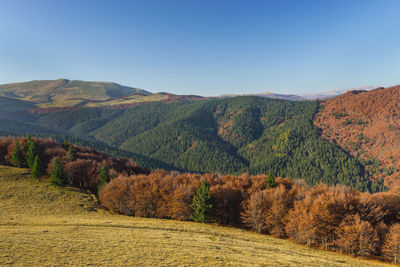 Scenic view of mountains against clear sky