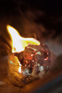 Close-up of burning candle