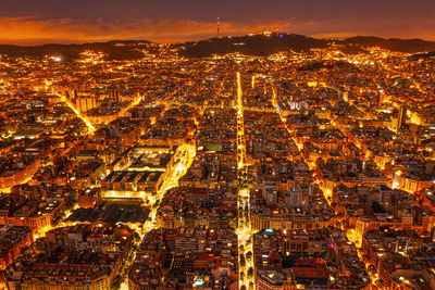 View of the residential areas of barcelona at night. city from a bird eye view