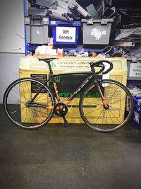 Bicycle parked in front of store