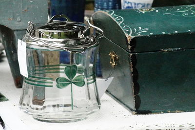 Close-up of glass jar on table