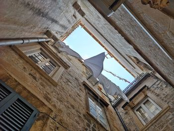 Low angle view of buildings against sky