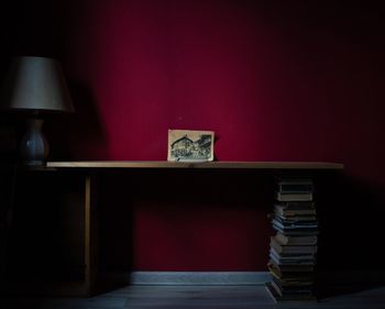 Stack of books on table at home