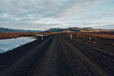 View of empty road along landscape