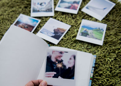 Close-up of man photographing