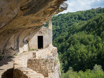 Low angle view of rock formations at hermitage  of san bartolomeo in legio