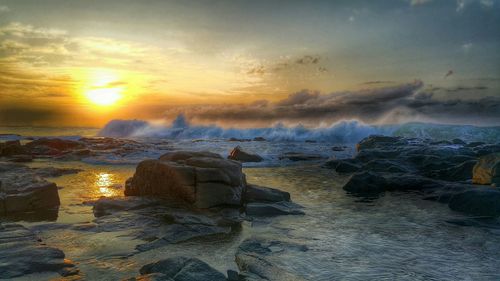 Scenic view of sunset over sea