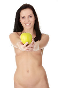Portrait of a beautiful young woman against white background