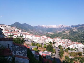 High angle view of houses against clear sky