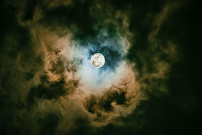 Low angle view of moon against sky