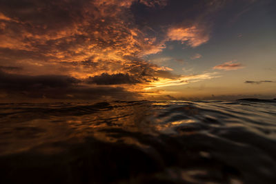 Scenic view of sea against dramatic sky