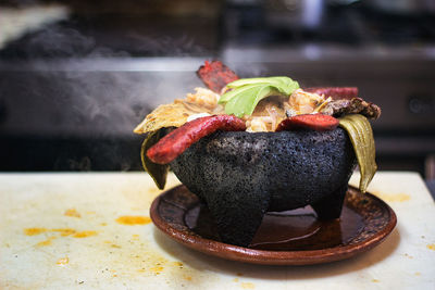 Close-up of food served on table