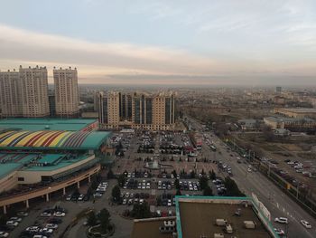 Aerial view of cityscape against sky