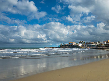 Scenic view of beach against sky