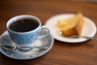 Close-up of coffee served on table