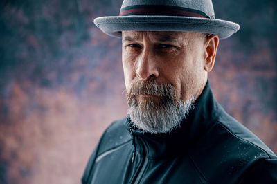 Portrait of man wearing hat