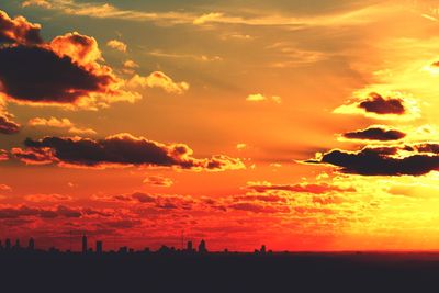 Scenic view of dramatic sky during sunset