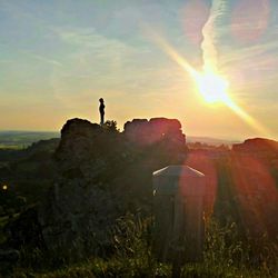 Scenic view of landscape against sky during sunset