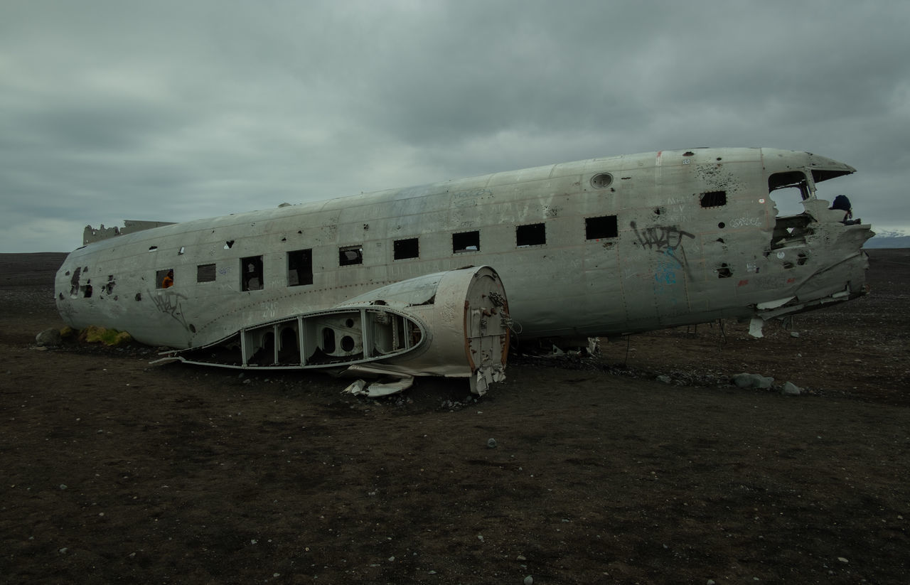 ABANDONED AIRPLANE ON AIRPORT RUNWAY