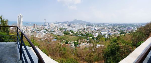 High angle view of buildings in city against sky