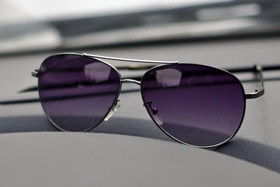 Close-up of sunglasses on table