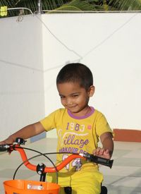 Boy riding bicycle