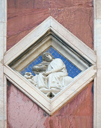 Mercury, relief on giotto campanile of cattedrale di santa maria del fiore, florence, italy