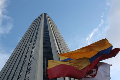 Low angle view of modern buildings against sky