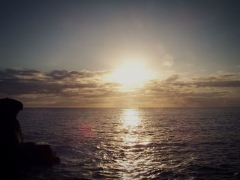 Scenic view of sea at sunset