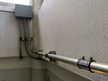 Close-up of pipe on wall